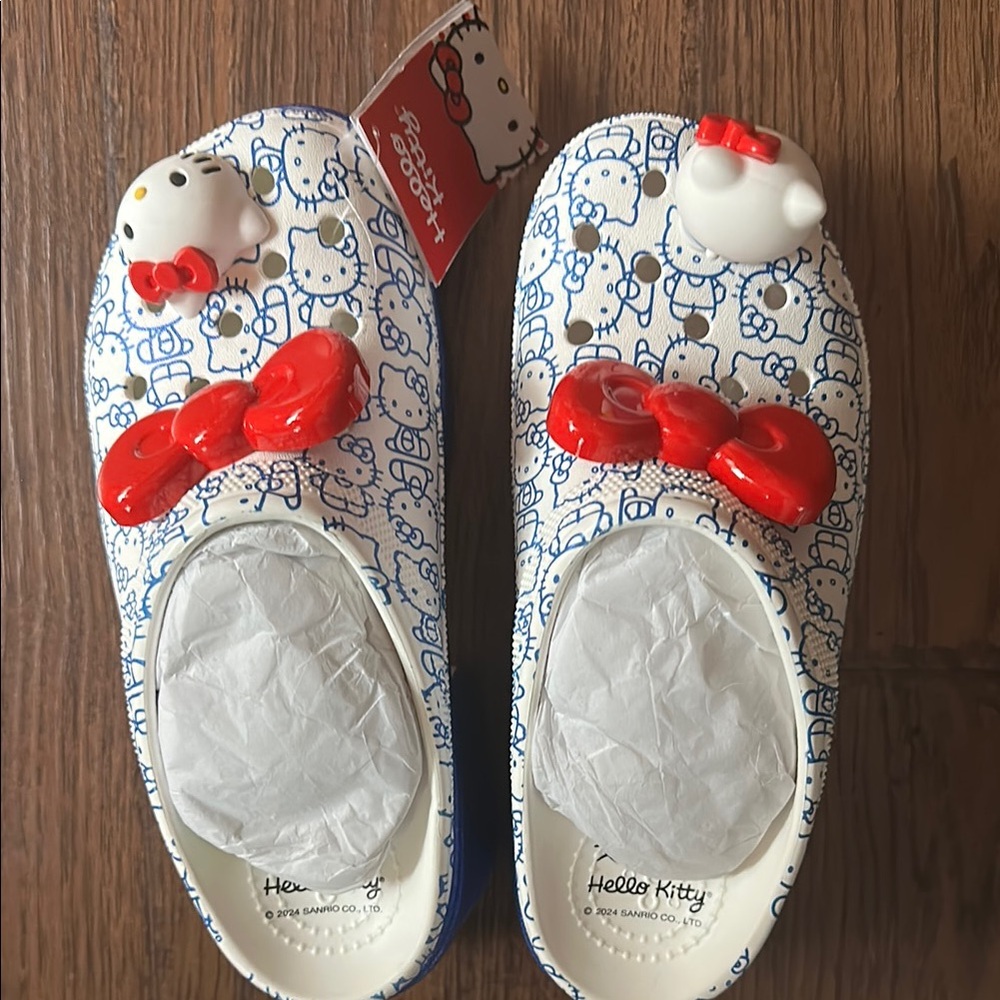 Brand New: Hello Kitty Red and White Crocs with Bow Accent